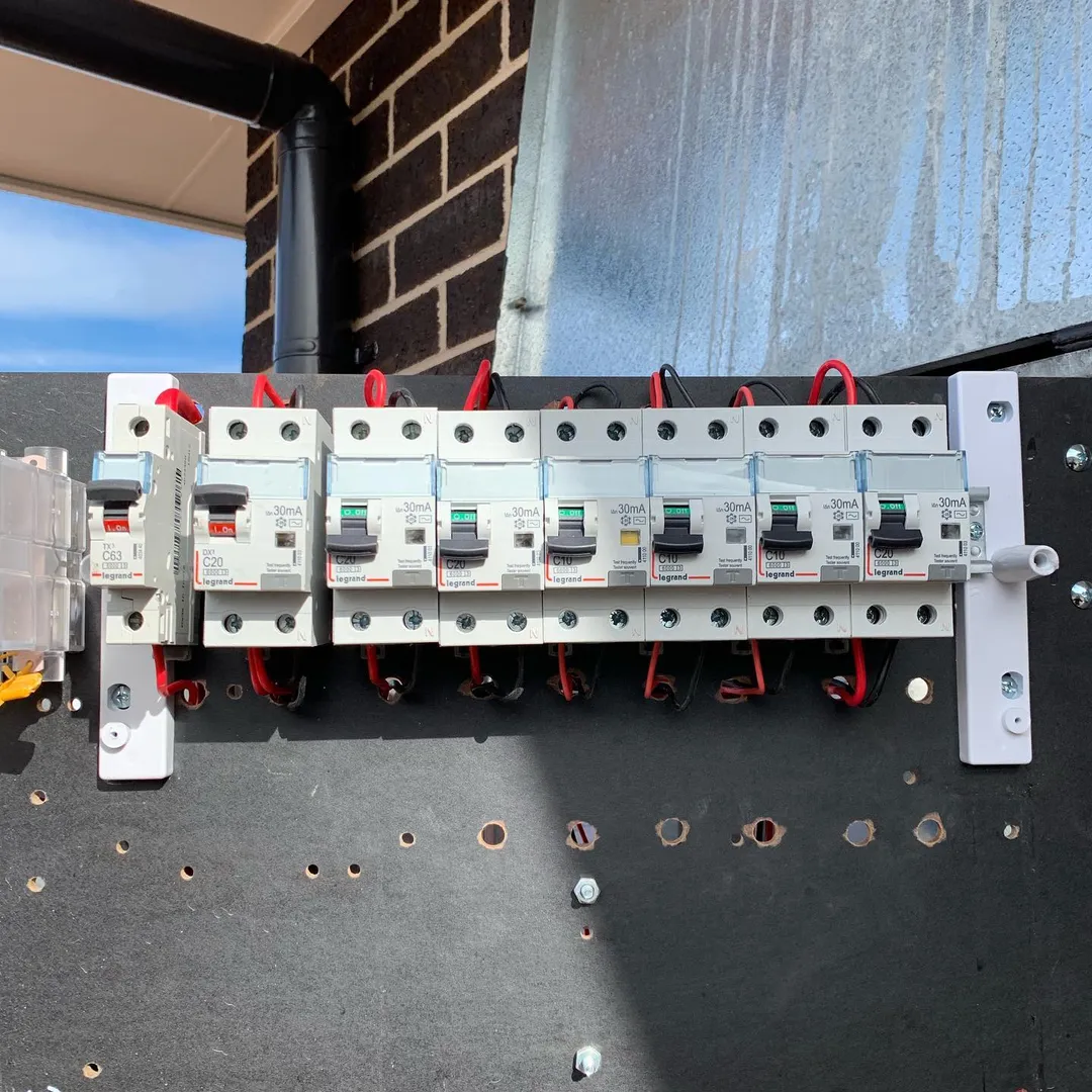 Electrical circuit breakers mounted on panel